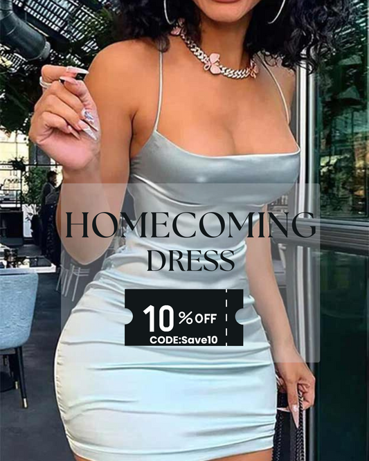 Woman wearing a sleek light blue homecoming dress with thin straps and a fitted silhouette