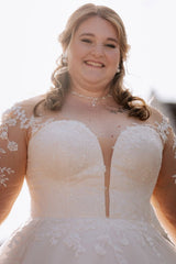 Ivory Deep V-Neck Tulle Ball Gown Wedding Dress with Lace Appliques and Long Sleeves Bodice Detail