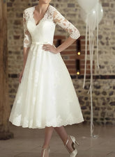 Ivory V-Neck A-Line Wedding Dress with Lace Appliques and Bow