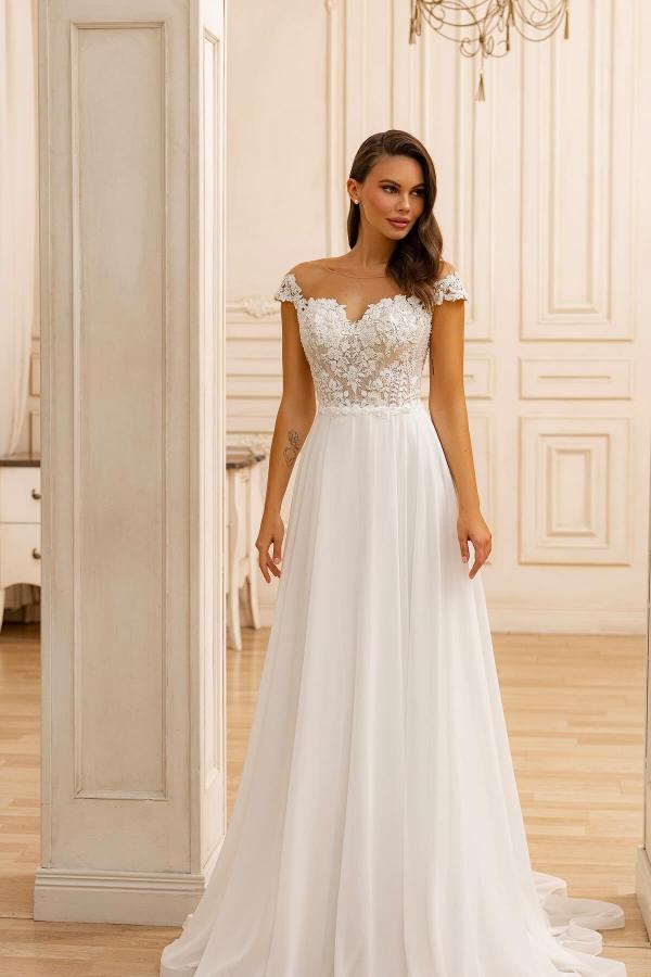 White Sweetheart A-Line Sweep Train Wedding Dress with Lace Appliques and Cap Sleeves