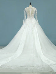 Ball Gown Illusion Tulle Chapel Train Wedding Dress With Beading