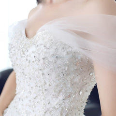 Beaded Off-the-shoulder Tulle Ball Gown Wedding Dress with Sweep Train