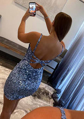 Sequins Homecoming Dress blue short fitted strappy open back bow detail shown in mirror selfie