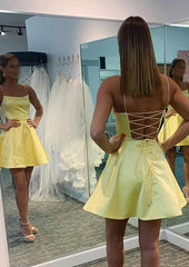 Short Homecoming Dress yellow satin A line with spaghetti straps and lace up back in fitting room