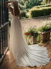 Elegant chiffon wedding dress with long flowing train and sleeveless design by 27dress