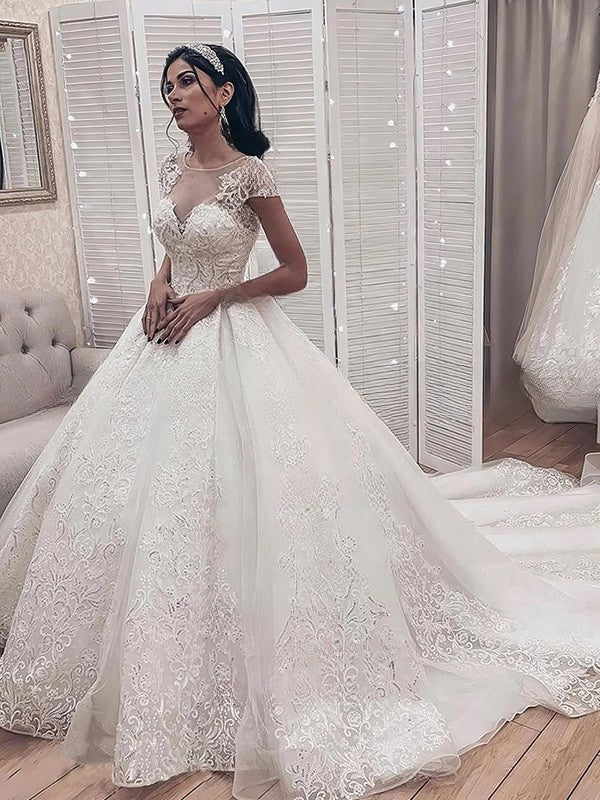 Illusion Tulle Ball Gown Wedding Dress with Appliques Lace and Sweep Train main image 0