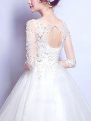 Glamorous Ball Gown Wedding Dress with Beaded Illusion Tulle