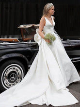 Gorgeous V-neck Satin Wedding Dress with Bow and Chapel Train