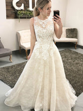 Illusion Lace Ball Gown Wedding Dress with Appliques and Sweep Train