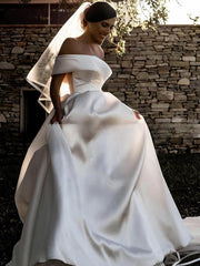 Stunning Off-the-shoulder Satin Ball Gown Wedding Dress With Pockets