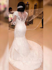 Stunning Trumpet/Mermaid Illusion Tulle Wedding Dress With Appliques Lace