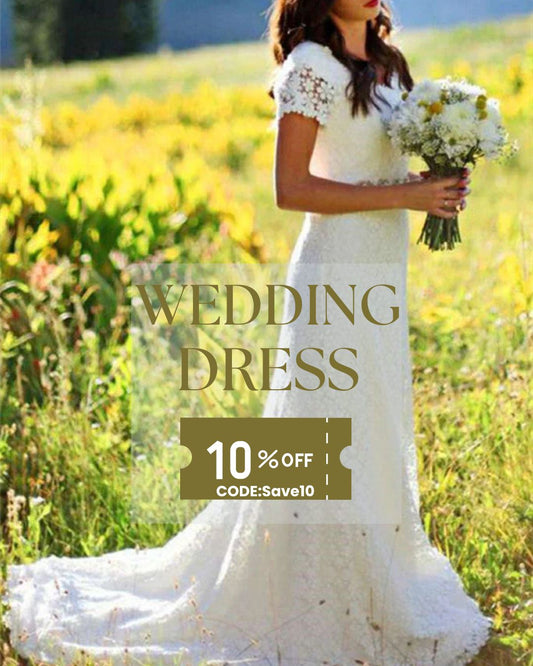 Bride wearing a white lace Boho Wedding Dresses holding a bouquet in a sunlit field