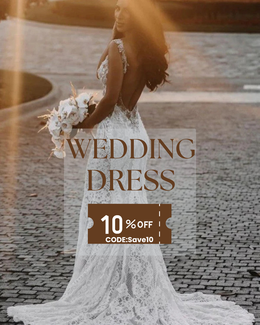 Bride wearing elegant lace wedding dresses with floral bouquet standing on cobblestone path