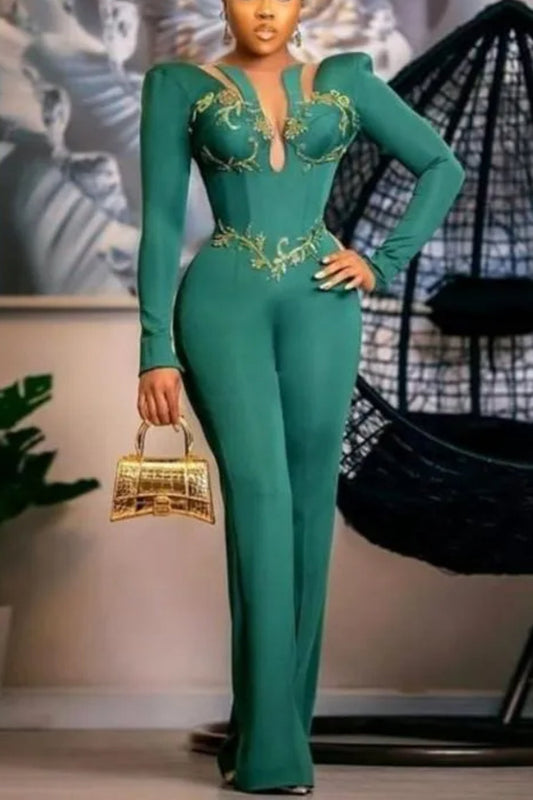 Emerald long sleeve lace jumpsuit as wedding guest attire