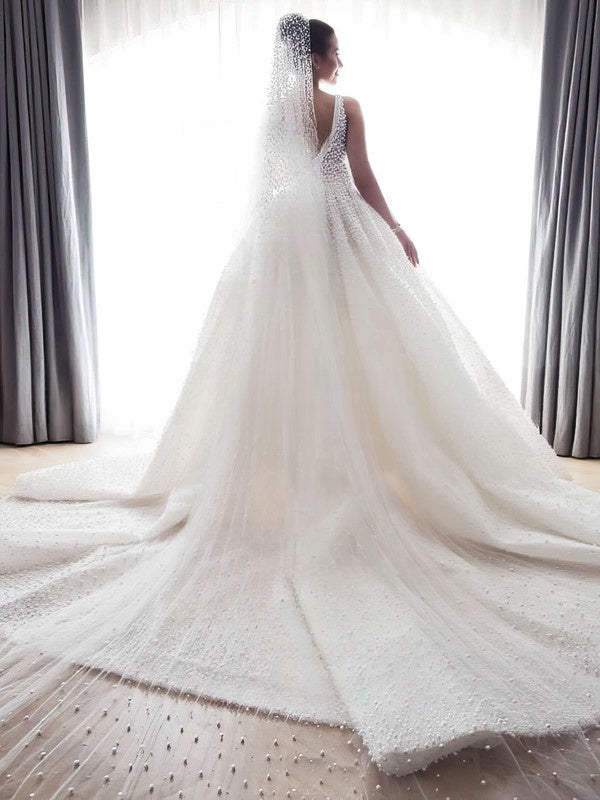 Ivory Deep V-Neck Ball Gown Chapel Train Wedding Dress with Long Sleeves Back View