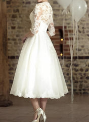 Ivory V-Neck A-Line Wedding Dress with Lace Appliques and Bow Back View