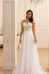 White Sweetheart A-Line Sweep Train Wedding Dress with Lace Appliques and Cap Sleeves