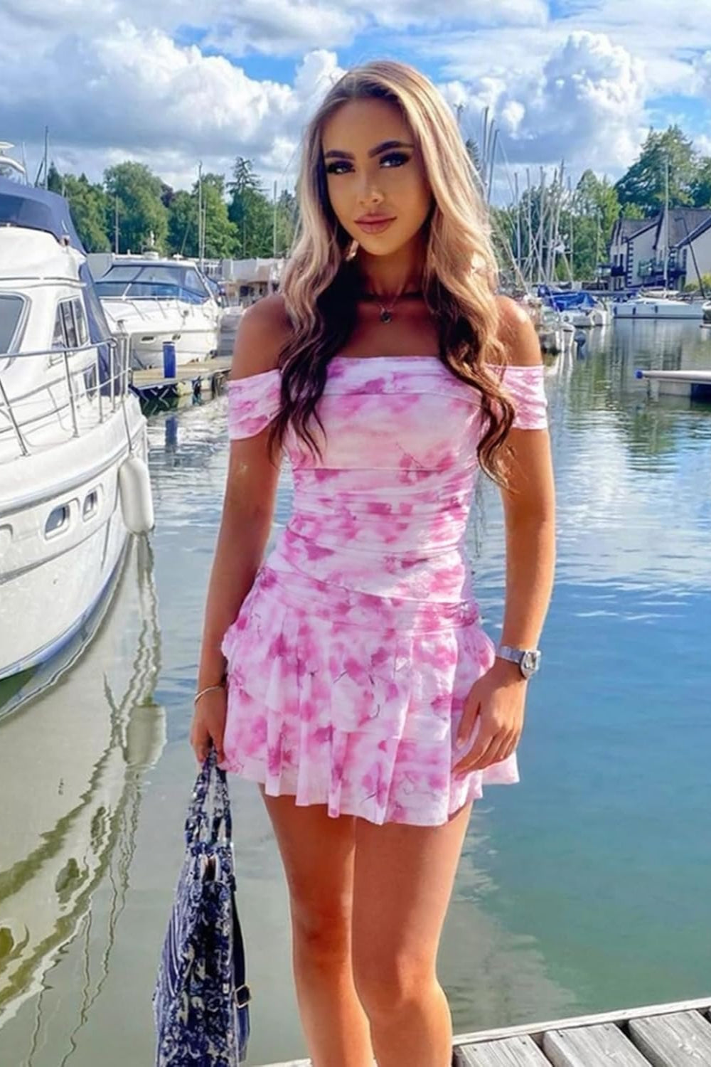 27dress pink tie dye off shoulder ruffle mini Homecoming Dresses look on model by marina with boats