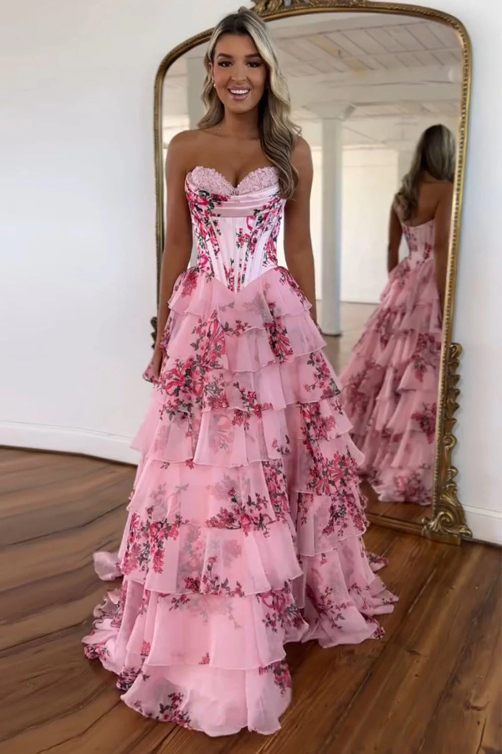Pink floral strapless prom dress with silk chiffon and tiered ruffles